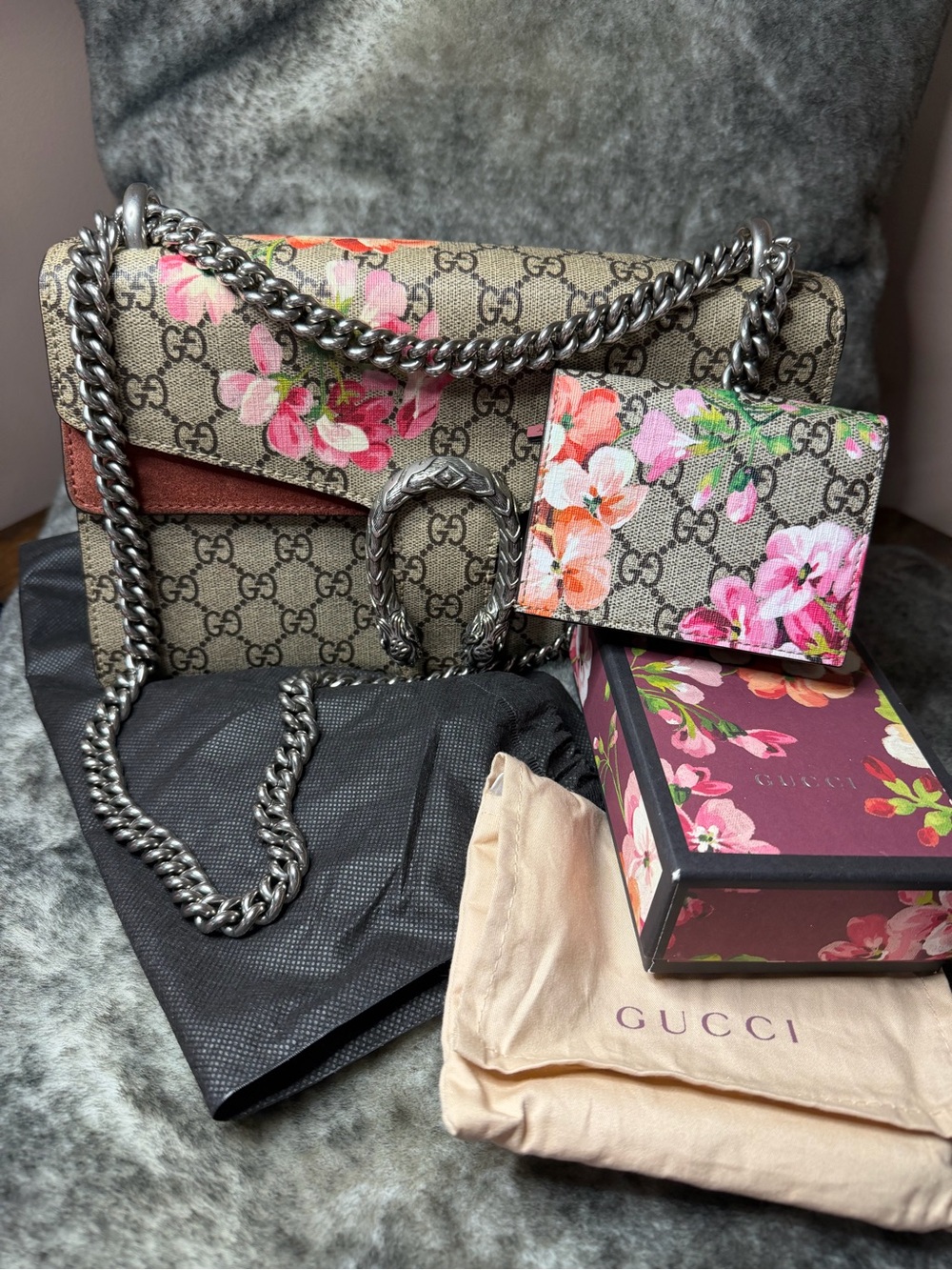 Gucci Bloom GG Supreme Shoulder Bag with matching bifold wallet.
